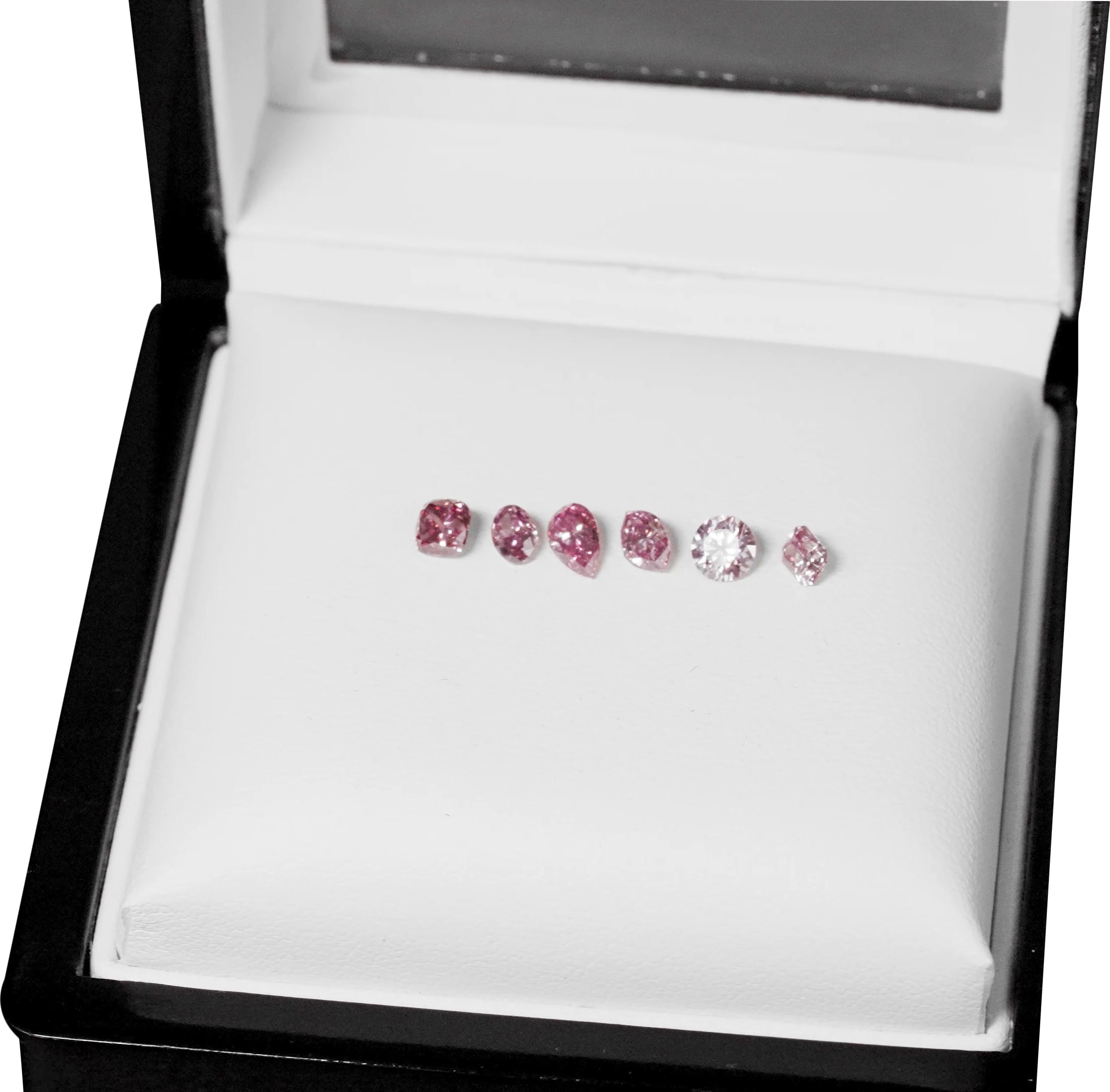 Different shapes of small pink diamonds